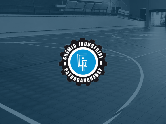 Brasão do Grêmio Industrial Patobranquense sobre a quadra do ginásio